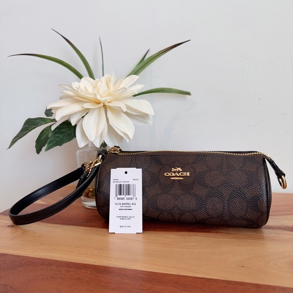 NWT Coach Nolita Barrel Bag
In Signature Canvas - Picture 5 of 5